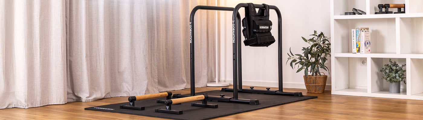 calisthenics equipment for athletes by athletes with parallettes, workout rings, wrist support, weight belt arm sleeves, tubular arms
