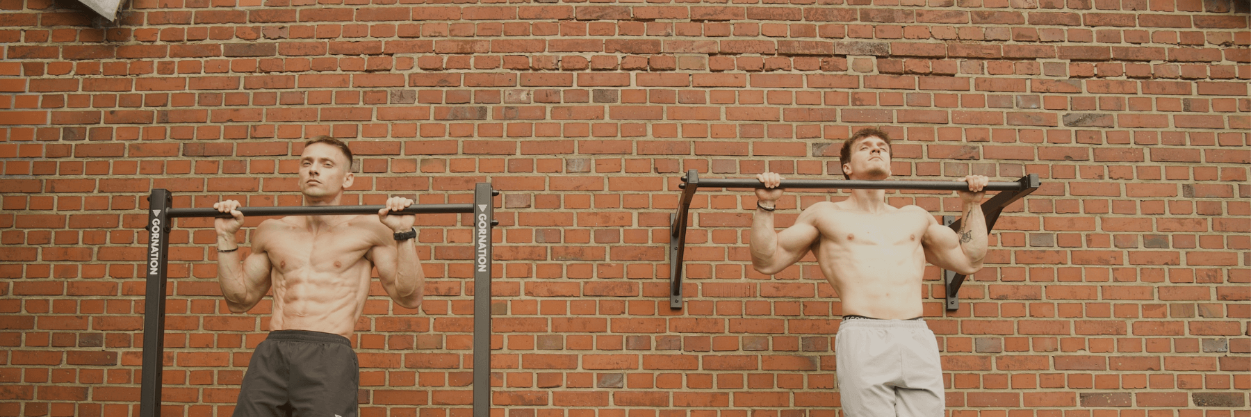 GORNATION athletes performing pull ups with the GORNATION Pull Up Station and Wall Mounted Pull Up Bar