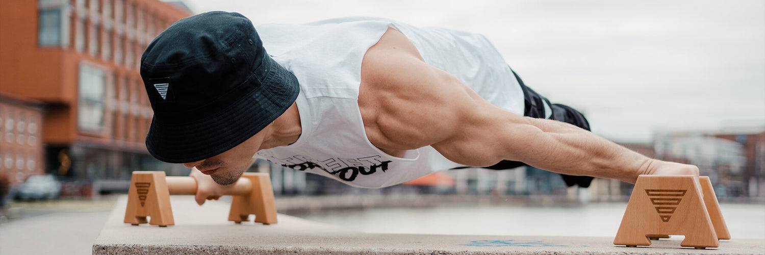Carlo Figus doing maltese plank with GORNATION parallettes