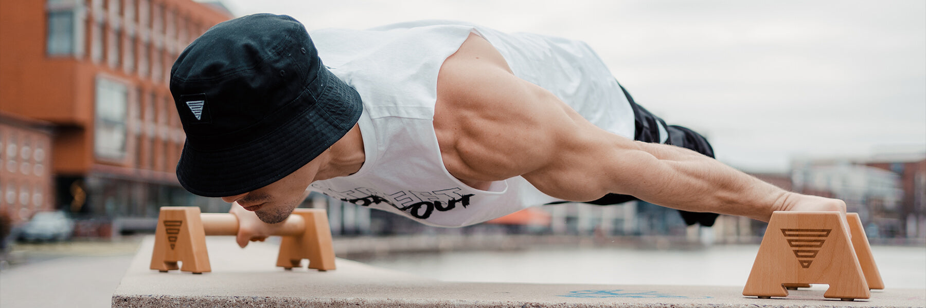 Carlo Figus doing maltese plank with GORNATION parallettes