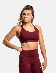 product photo of calisthenics bra in burgundy. Front side