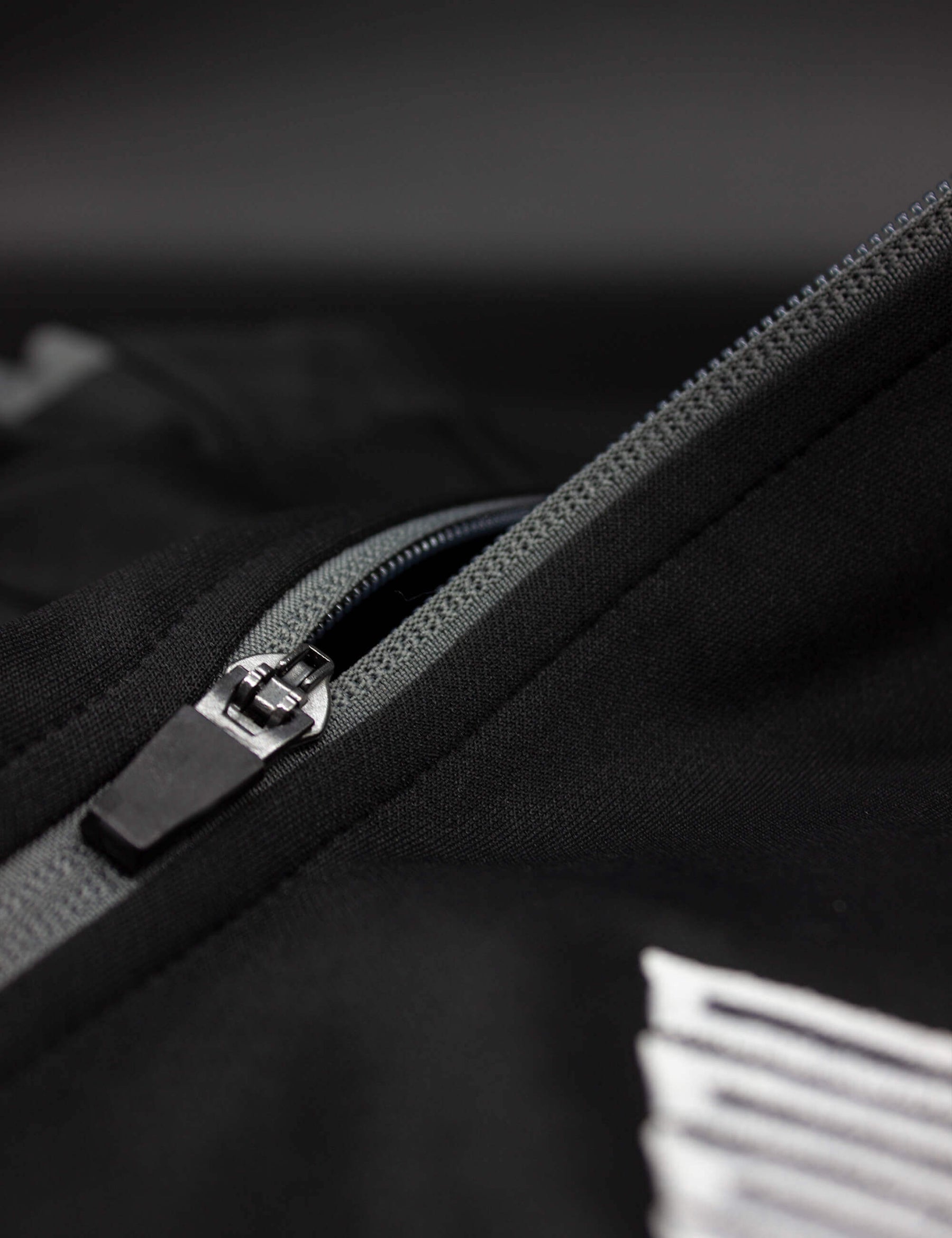 Detail shot of black/grey calisthenics jacket
