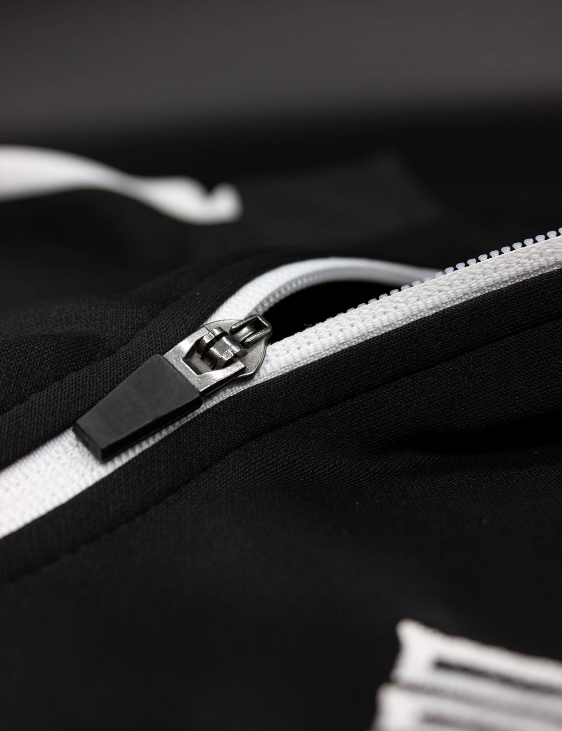 Detail shot of black/white calisthenics jacket
