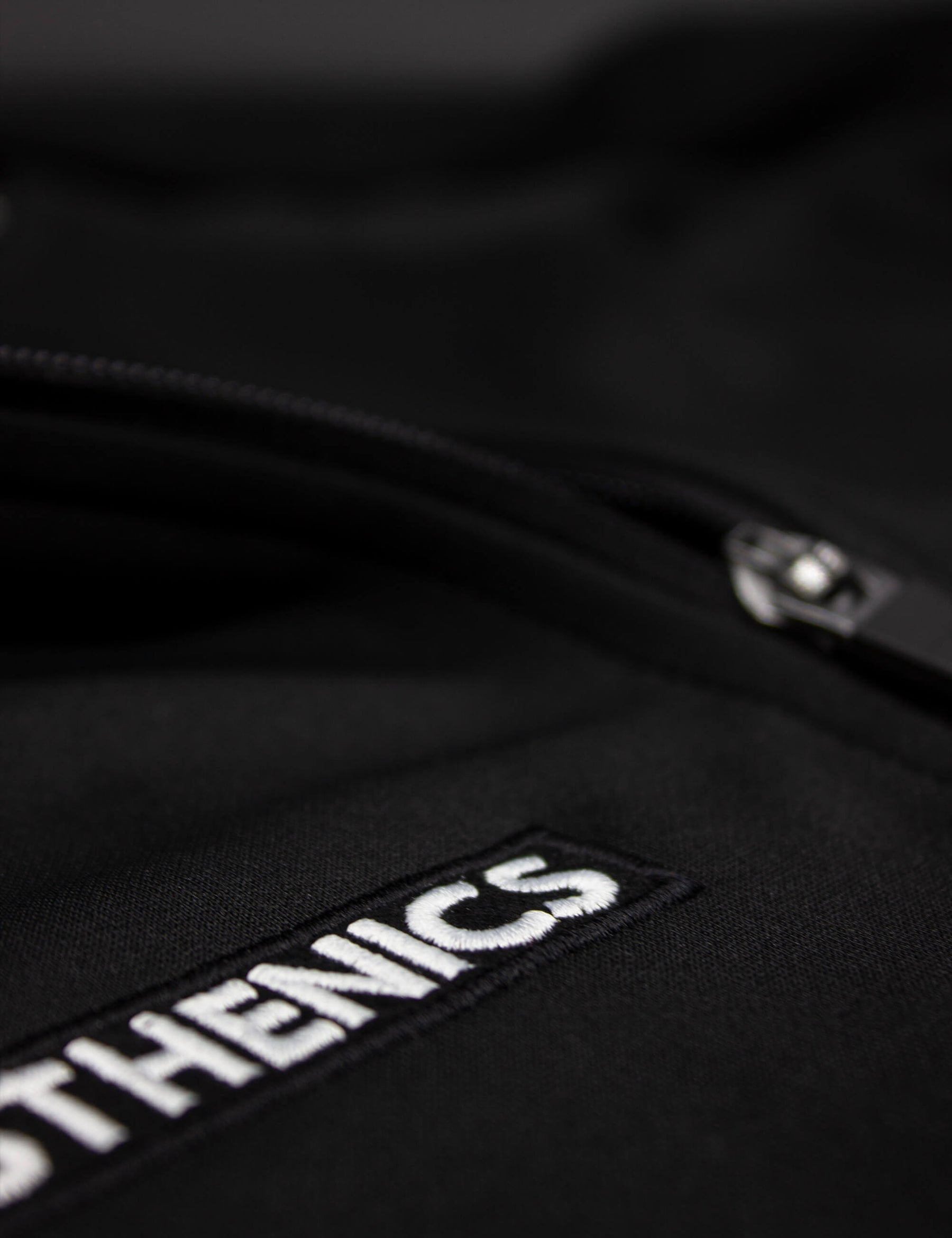 Detail shot of black/white calisthenics jacket