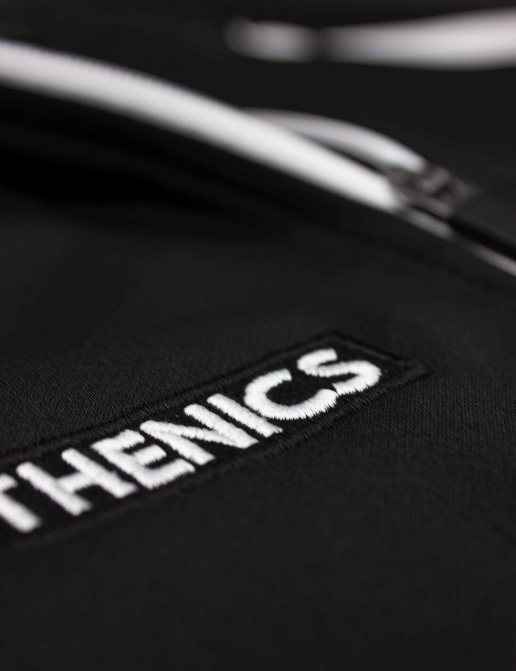 Detail shot of black/white calisthenics jacket