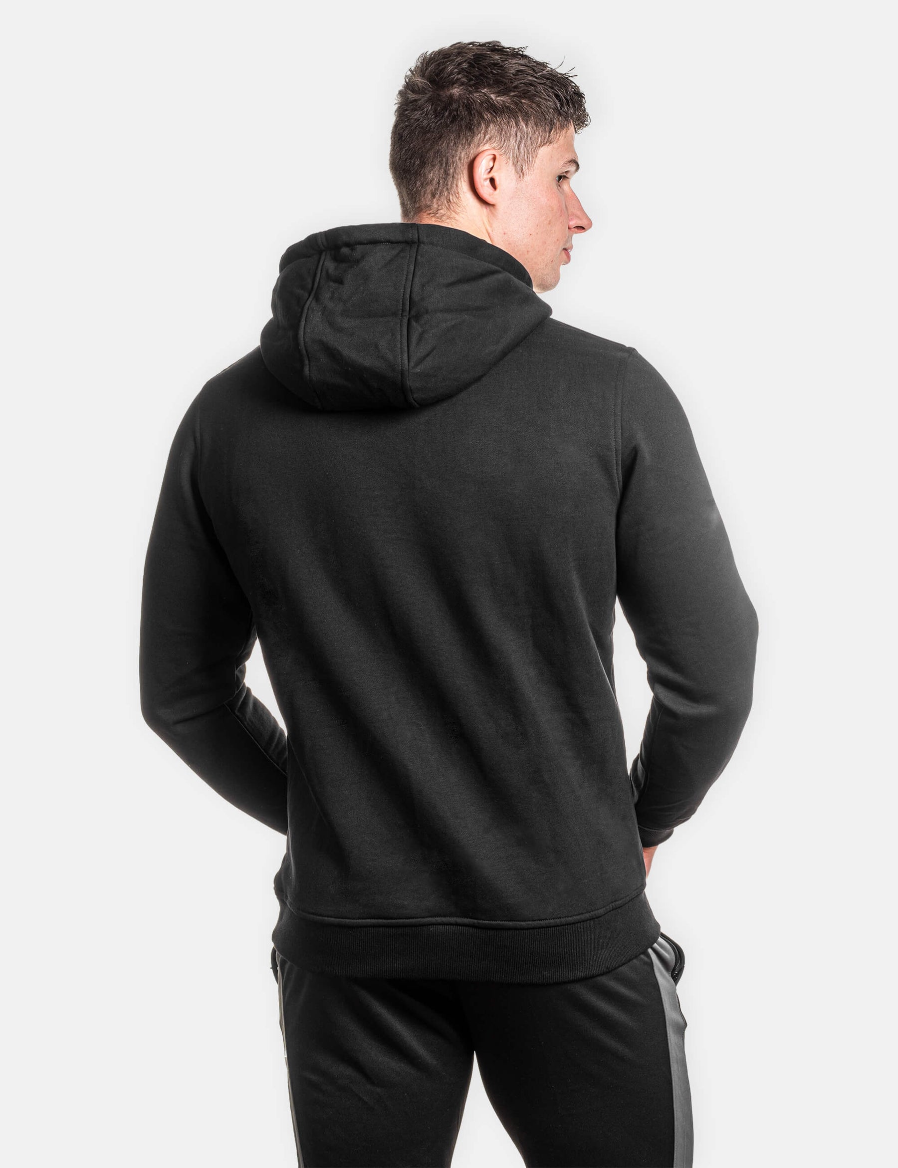Backview of the Calisthenics Black hoodie and performance sweatpants.